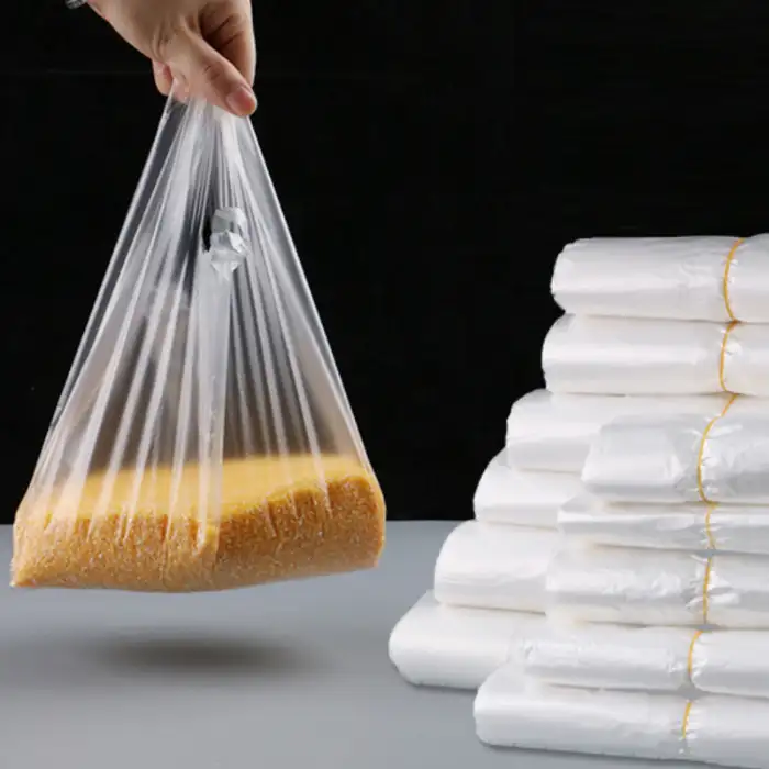 Bao ni lông trắng trong 30kg có quai xách Bao ni lông trắng trong 30kg có quai xách