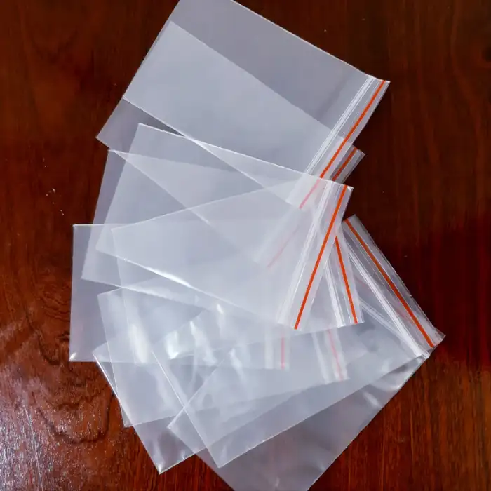 Túi zip chỉ đỏ 5x8.5cm trong suốt đựng đồ nhỏ gọn Túi zip chỉ đỏ 5x8.5cm trong suốt đựng đồ nhỏ gọn